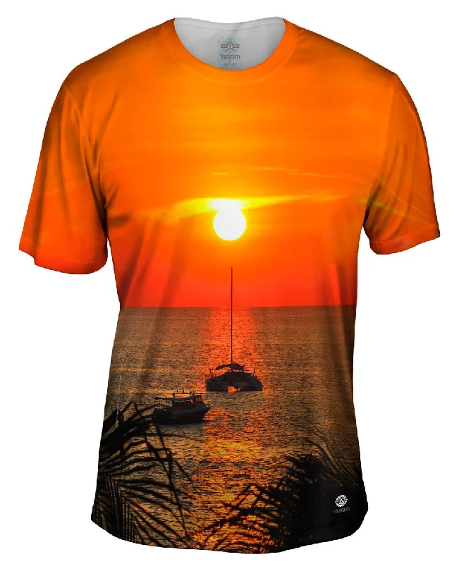 Take Advantage Catamaran Caught In The Sunset